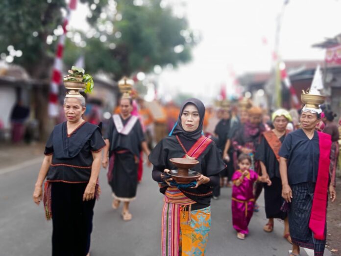 Budaya Songak Bejango Bleq